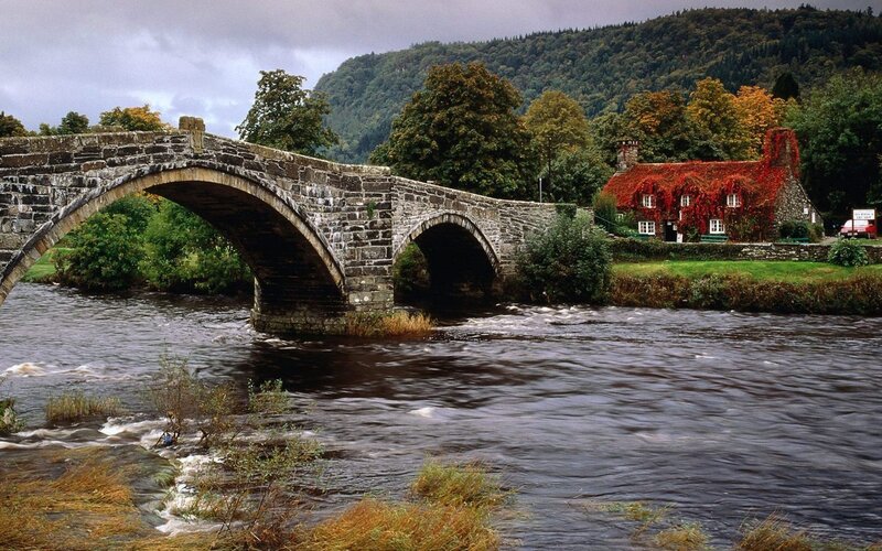 Stone Bridge over River — Green, Serene, Autumn, Photograph, House