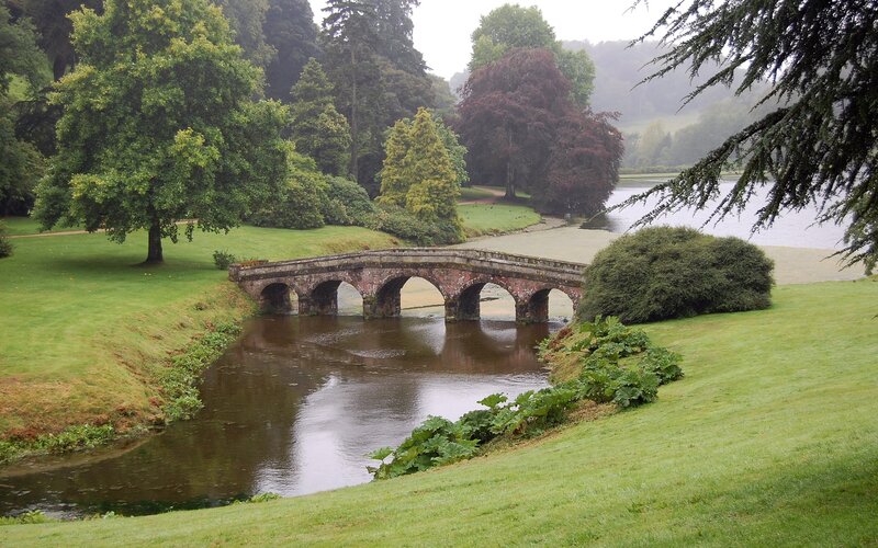 Stone Bridge over River — Green, Serene, Morning, Photograph, Trees, Grass, Brown, Gray