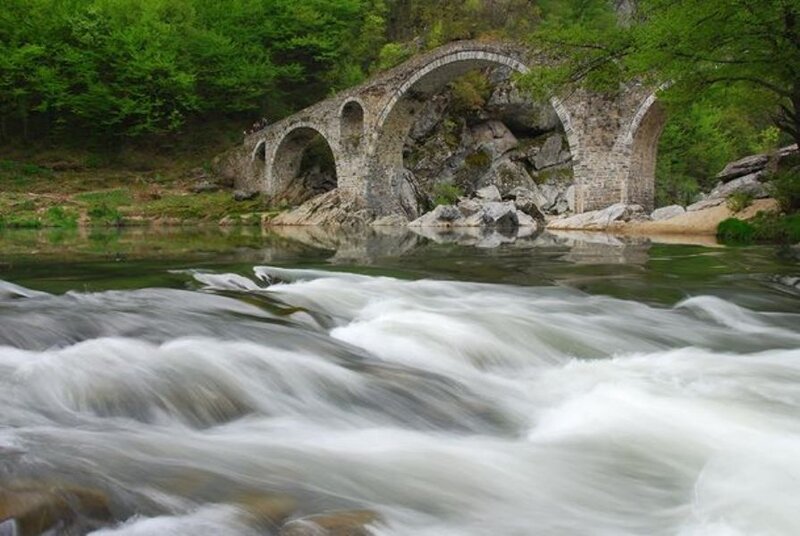 Stone Bridge over River — Green, Serene, Spring, Photograph, Trees, Rocks