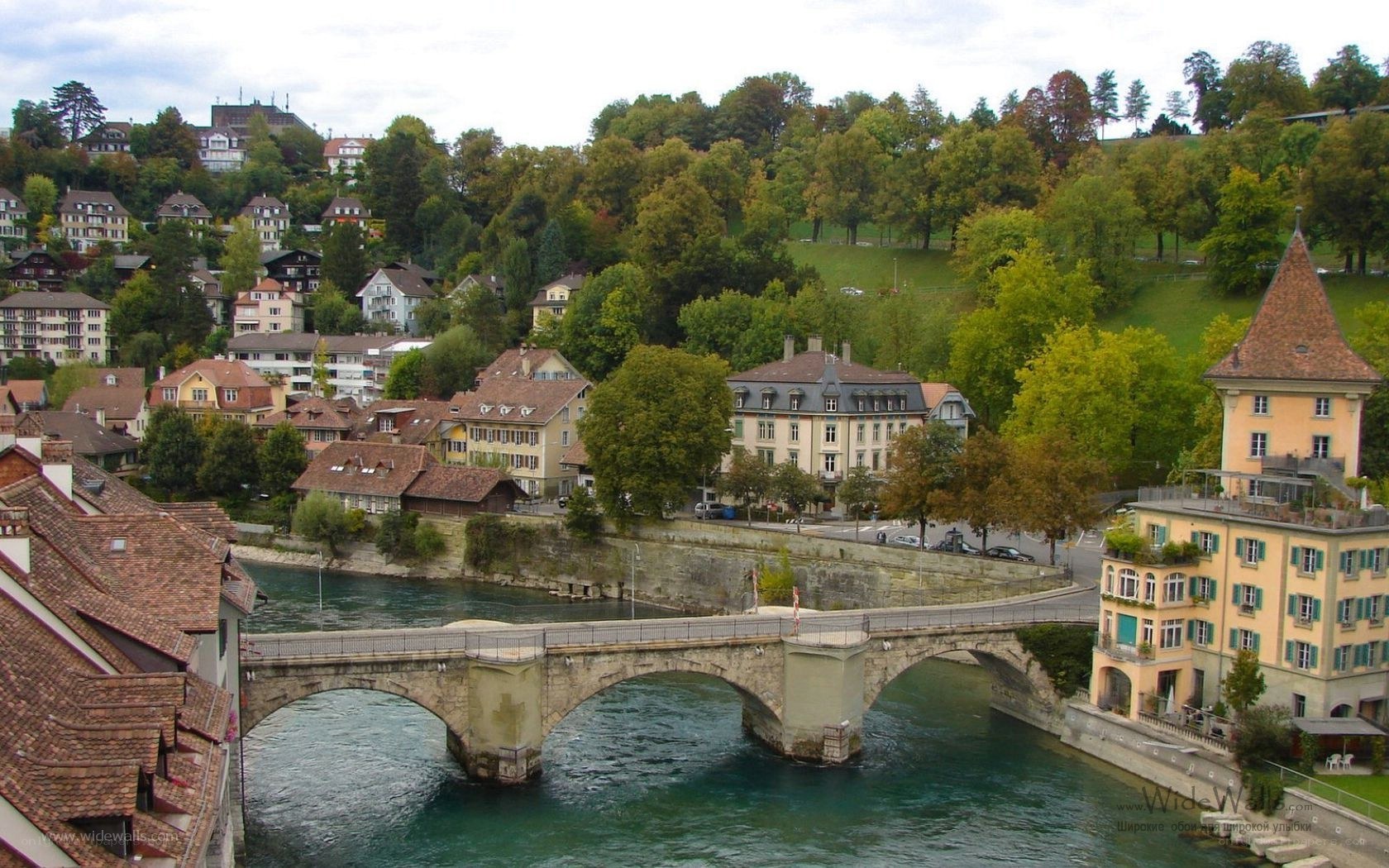 Stone bridge over river in Swiss town
