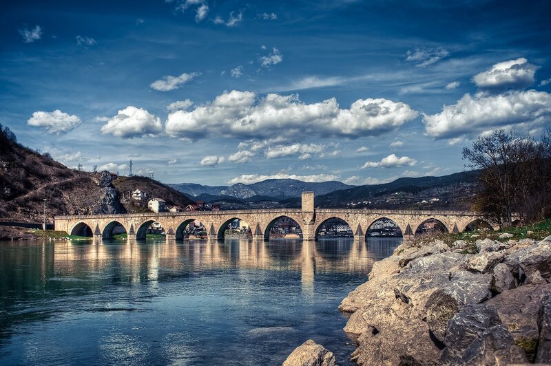 Stone bridge over river landscape