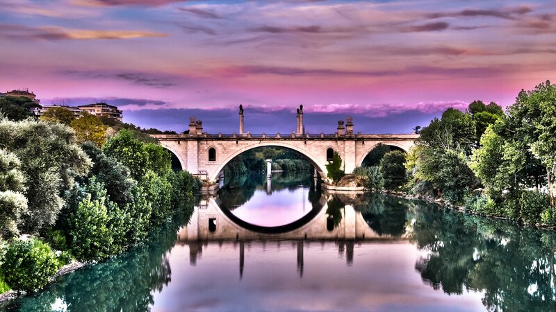 Stone Bridge over River — Purple, Serene, Sunset, Photograph, Trees
