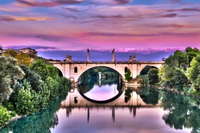 Stone Bridge over River — Purple