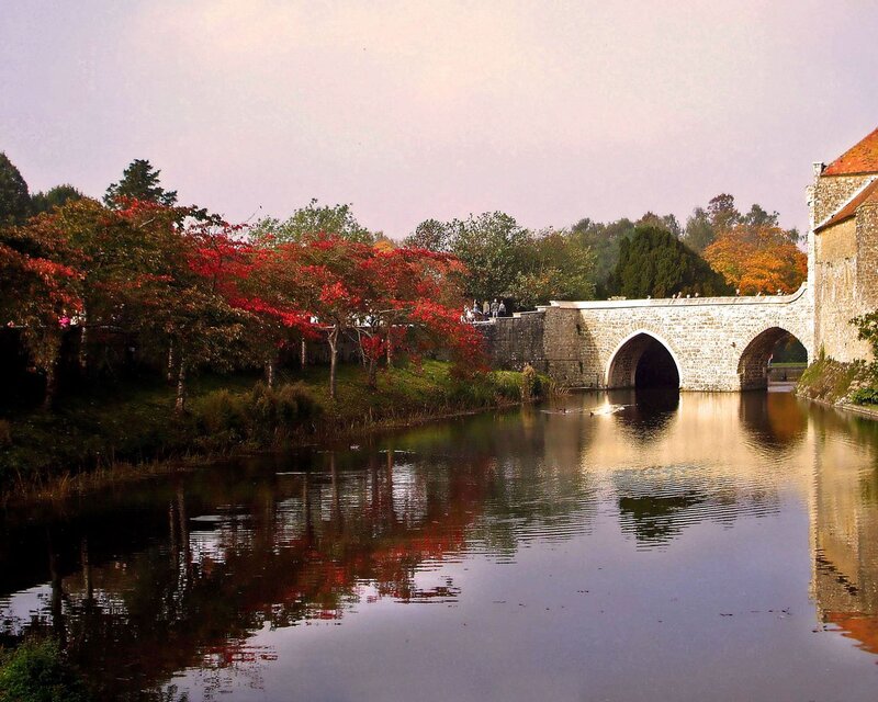 Stone Bridge over River — Red, Serene, Autumn