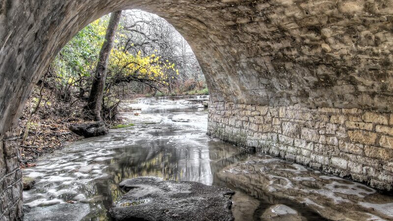 Stone Bridge over Stream — Gray