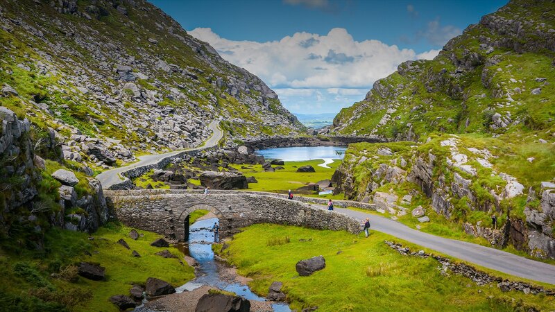Stone Bridge over Stream — Green, Serene, Afternoon, Photograph, Road, Mountains