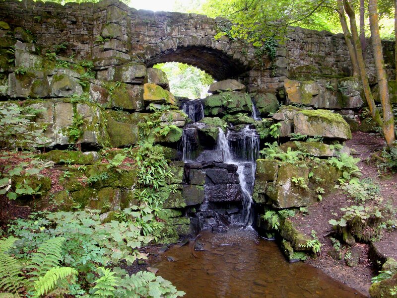 Stone bridge over waterfall