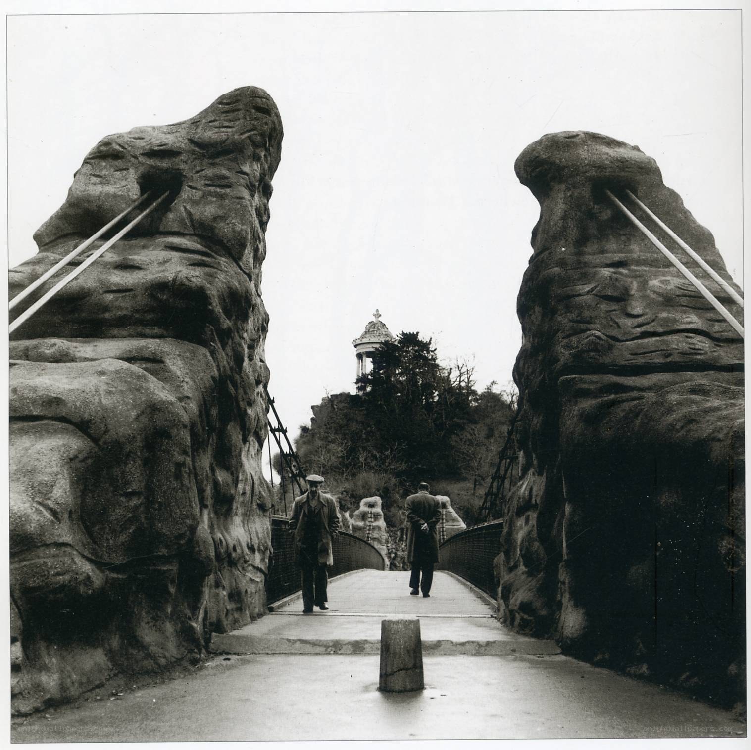 Stone bridge with people walking