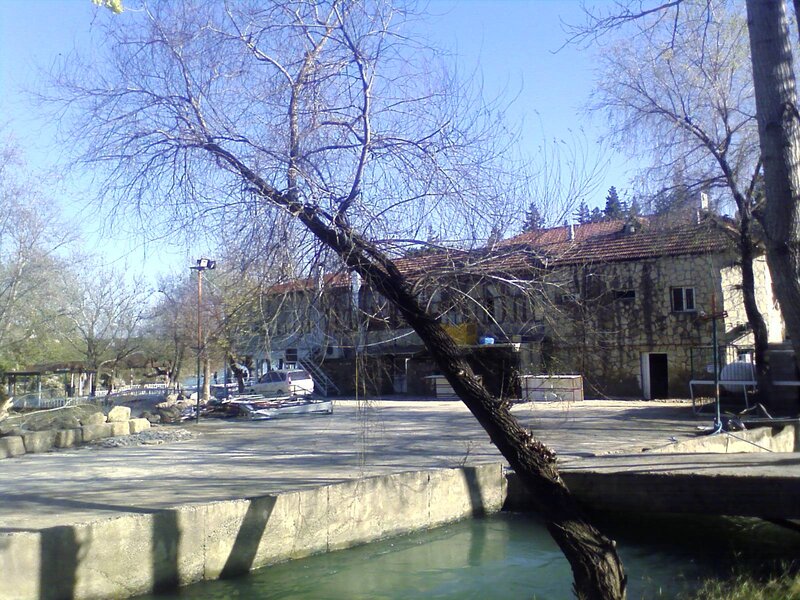 Stone building by a river