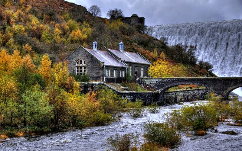 Stone Building by Waterfall