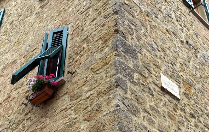 stone building with flower box