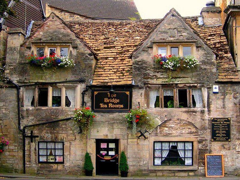 Stone Building with Flower Boxes — Brown