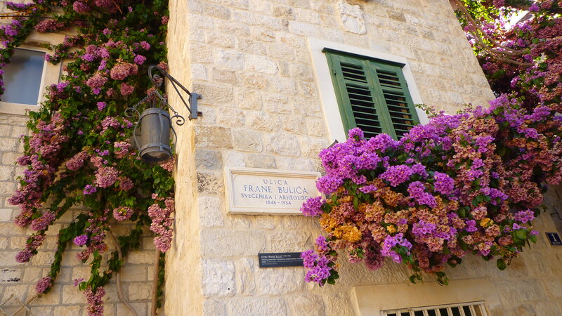 Stone Building with Flowers — Purple