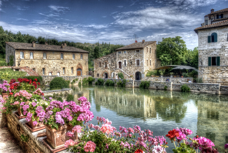Stone Buildings by Pond