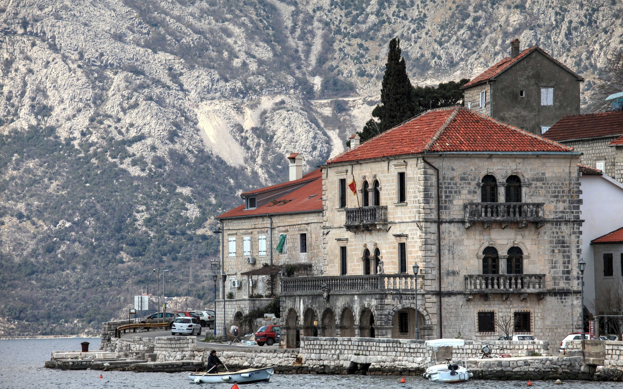 Stone buildings by the sea