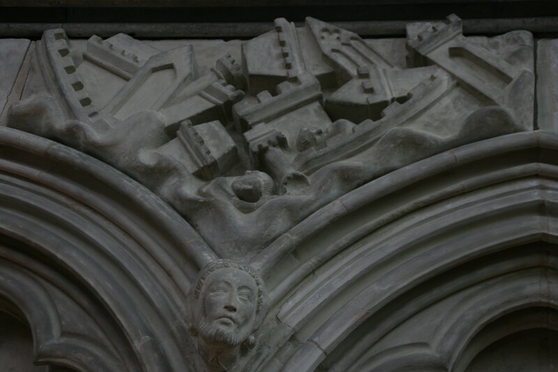 Stone carving of a cityscape