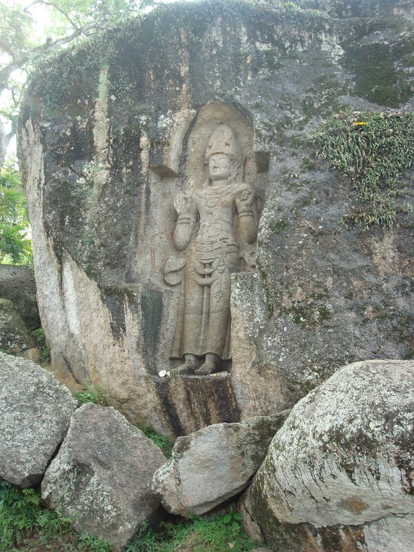 Stone carving of a deity