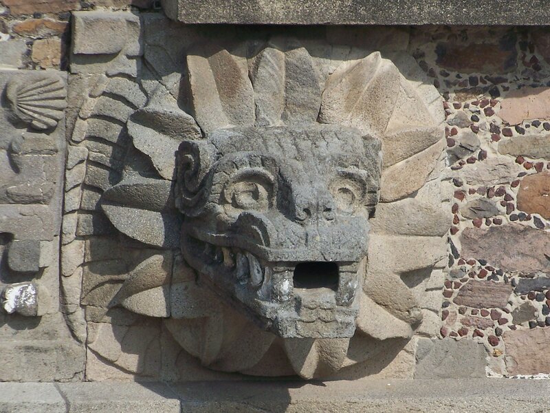 stone carving of a serpent head