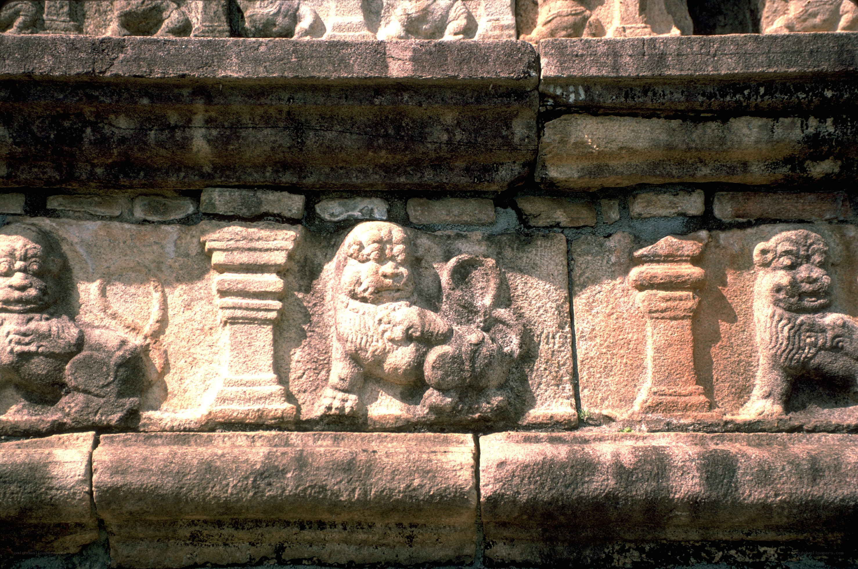 stone carvings on temple wall