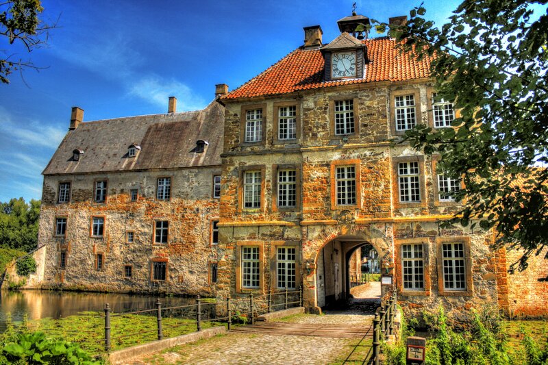 Stone Castle with Clock — Blue, Serene, Afternoon