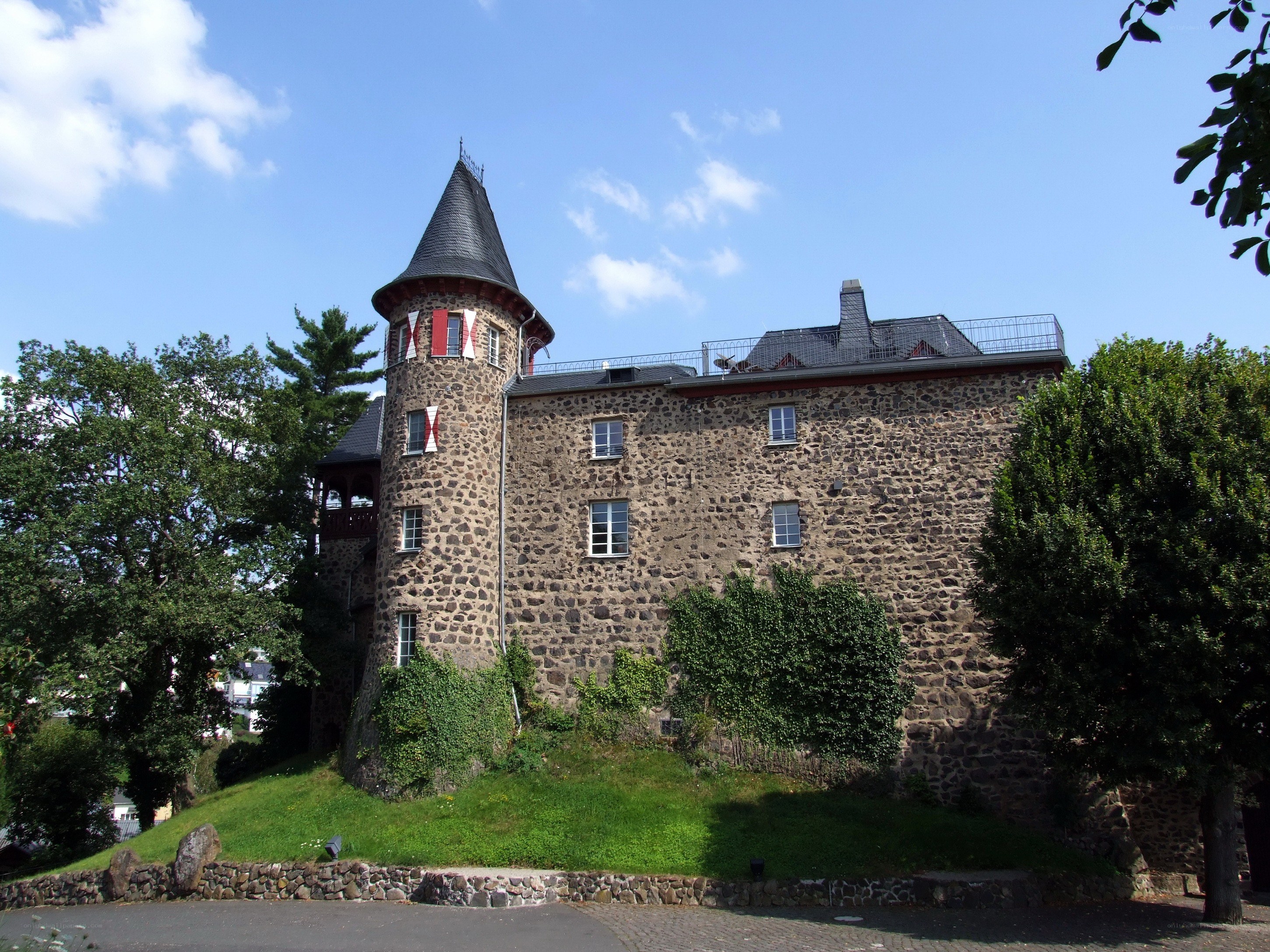 Stone castle with conical tower