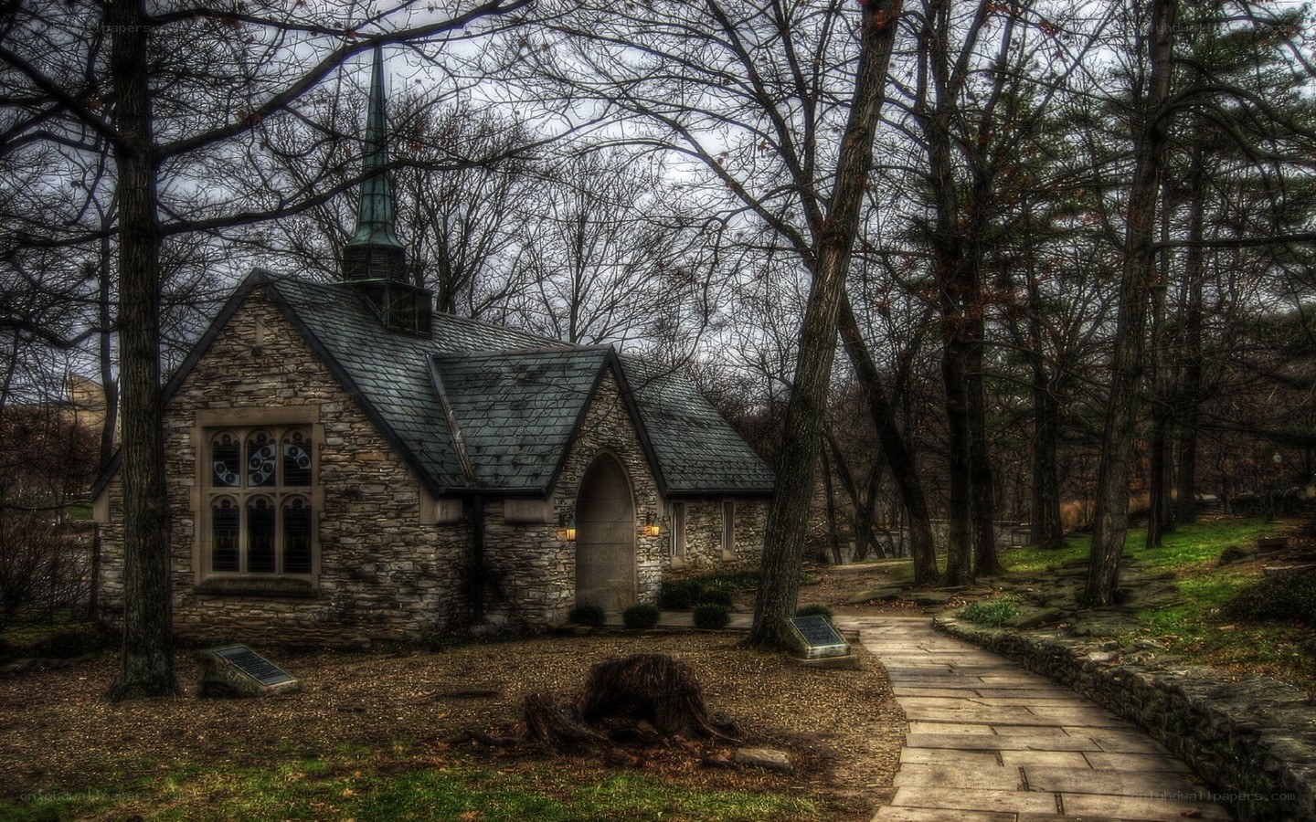 Stone chapel in wooded area