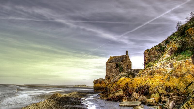 Stone Chapel on Rocky Shore