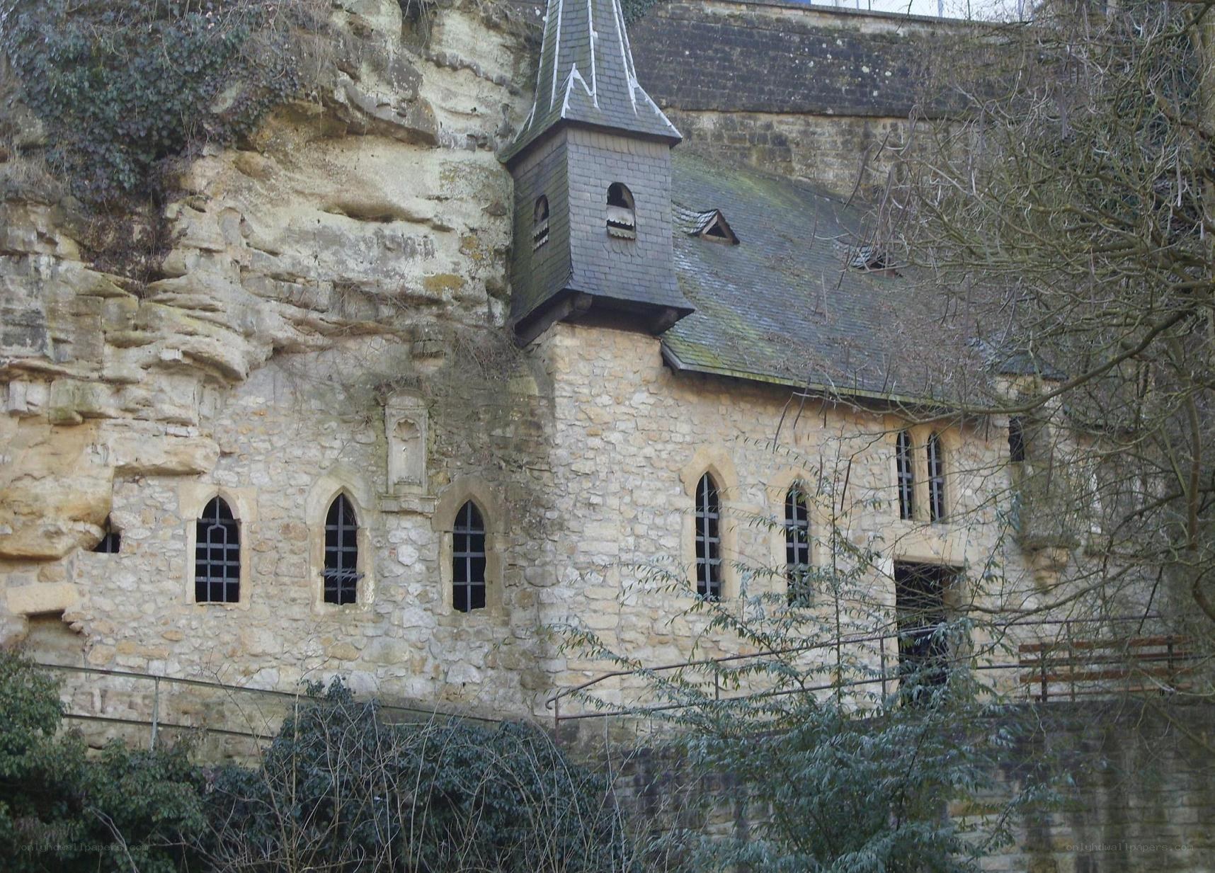 Stone church built into a cliff
