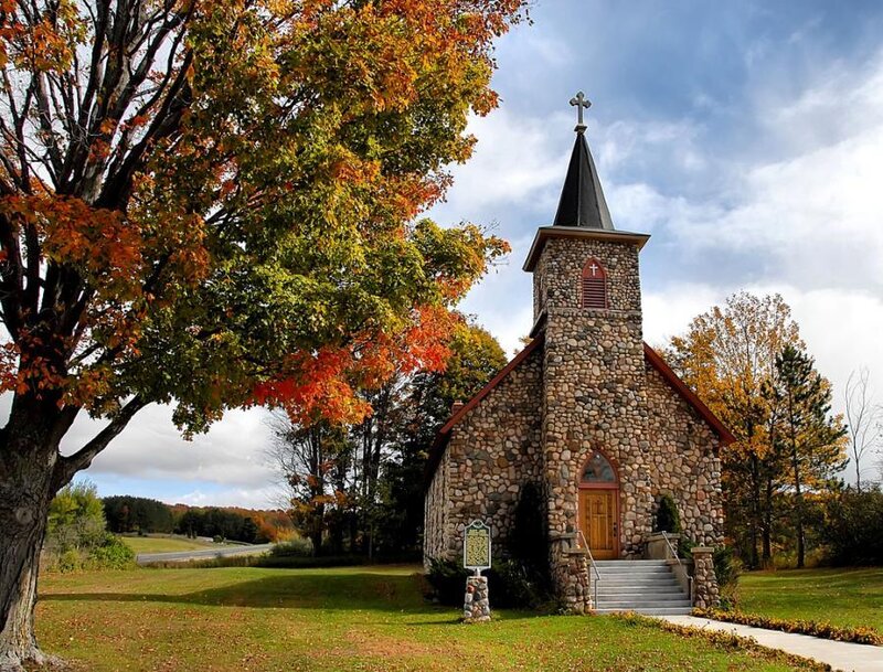 Stone church in autumn