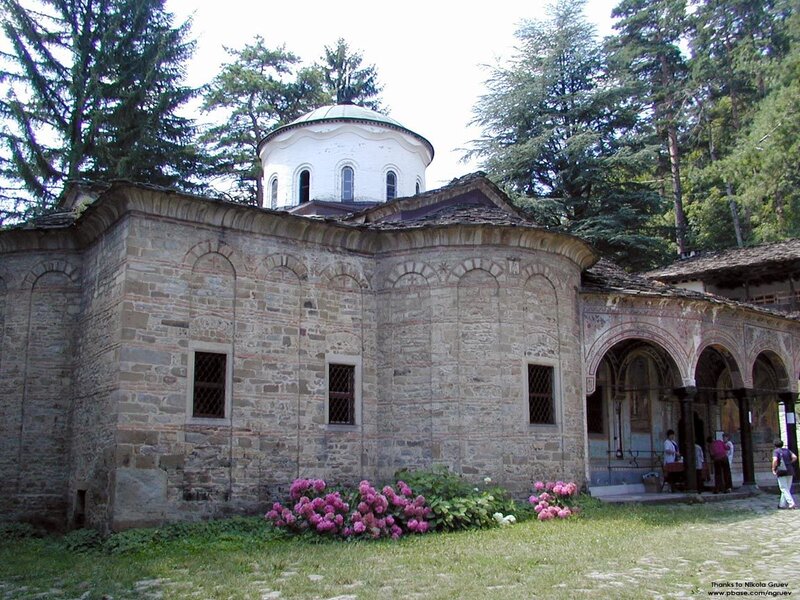 Stone church with dome and flowers