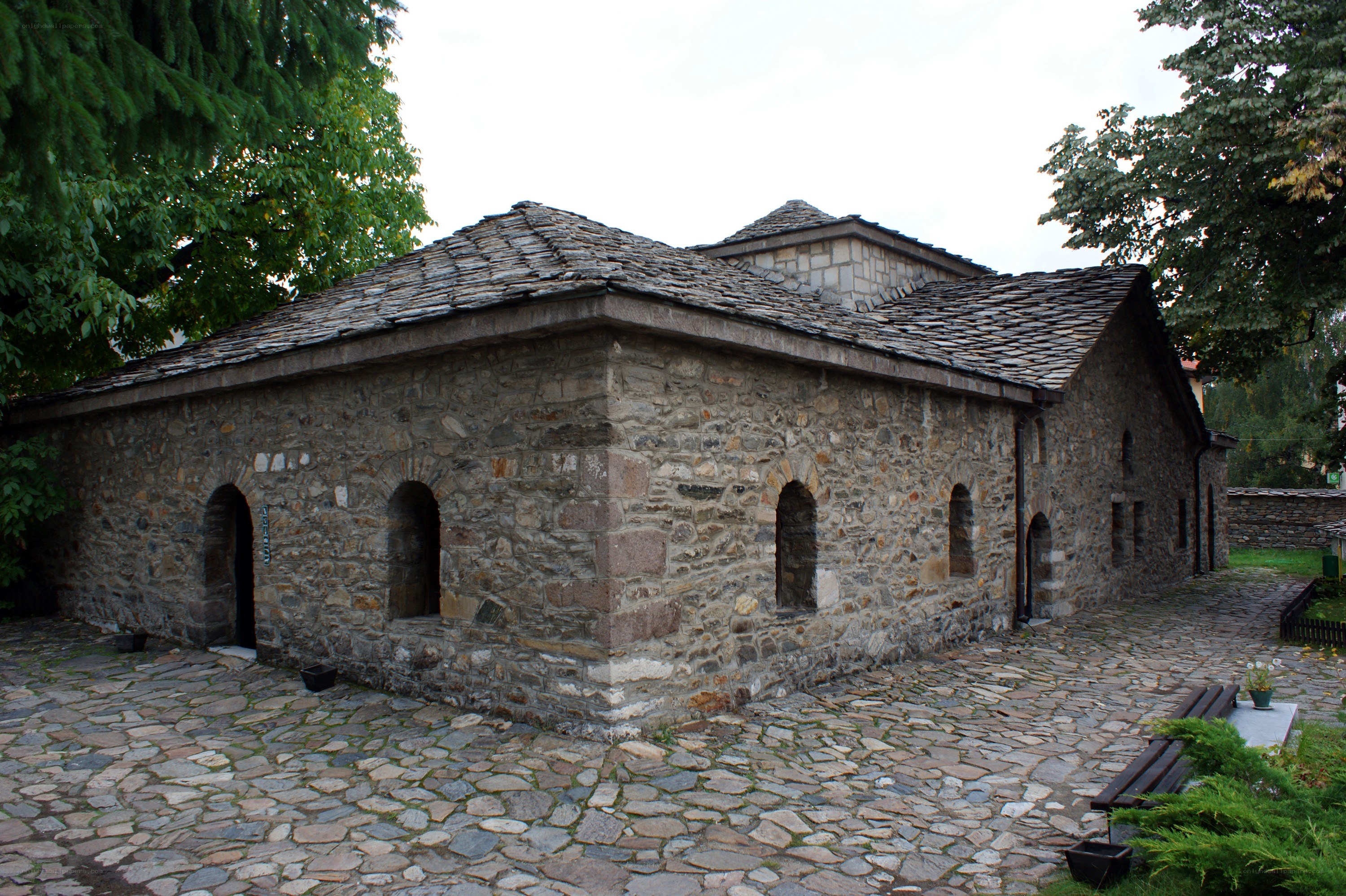 stone church with tiled roof