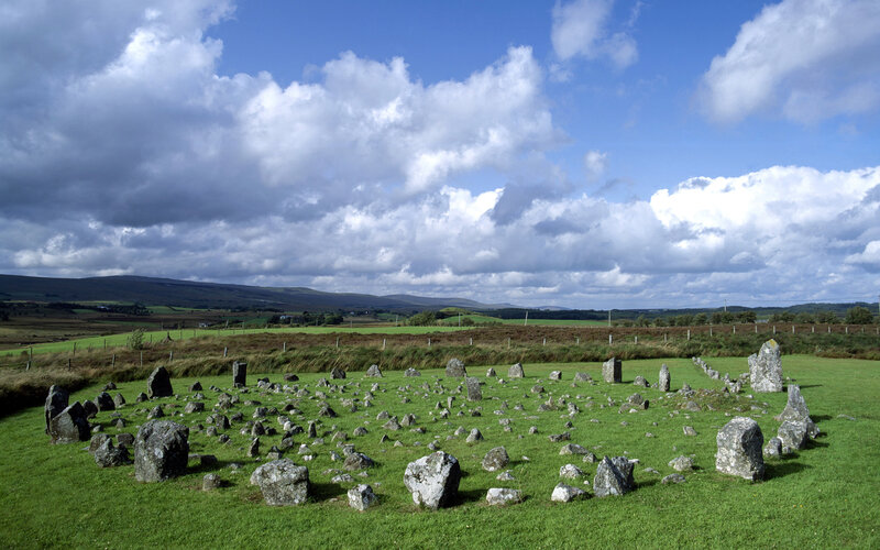 Stone circle in a green field