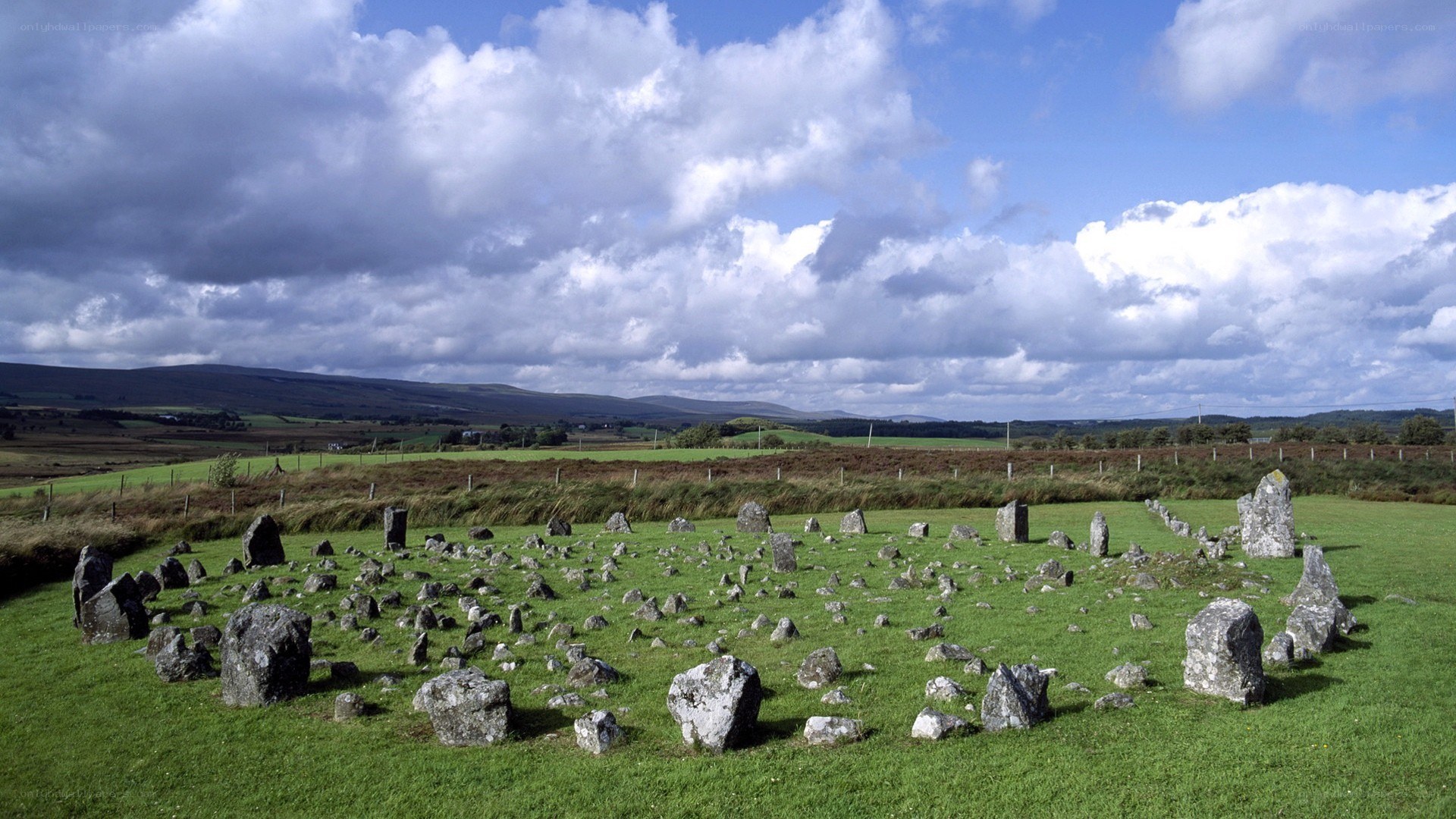 Stone circle in a green field