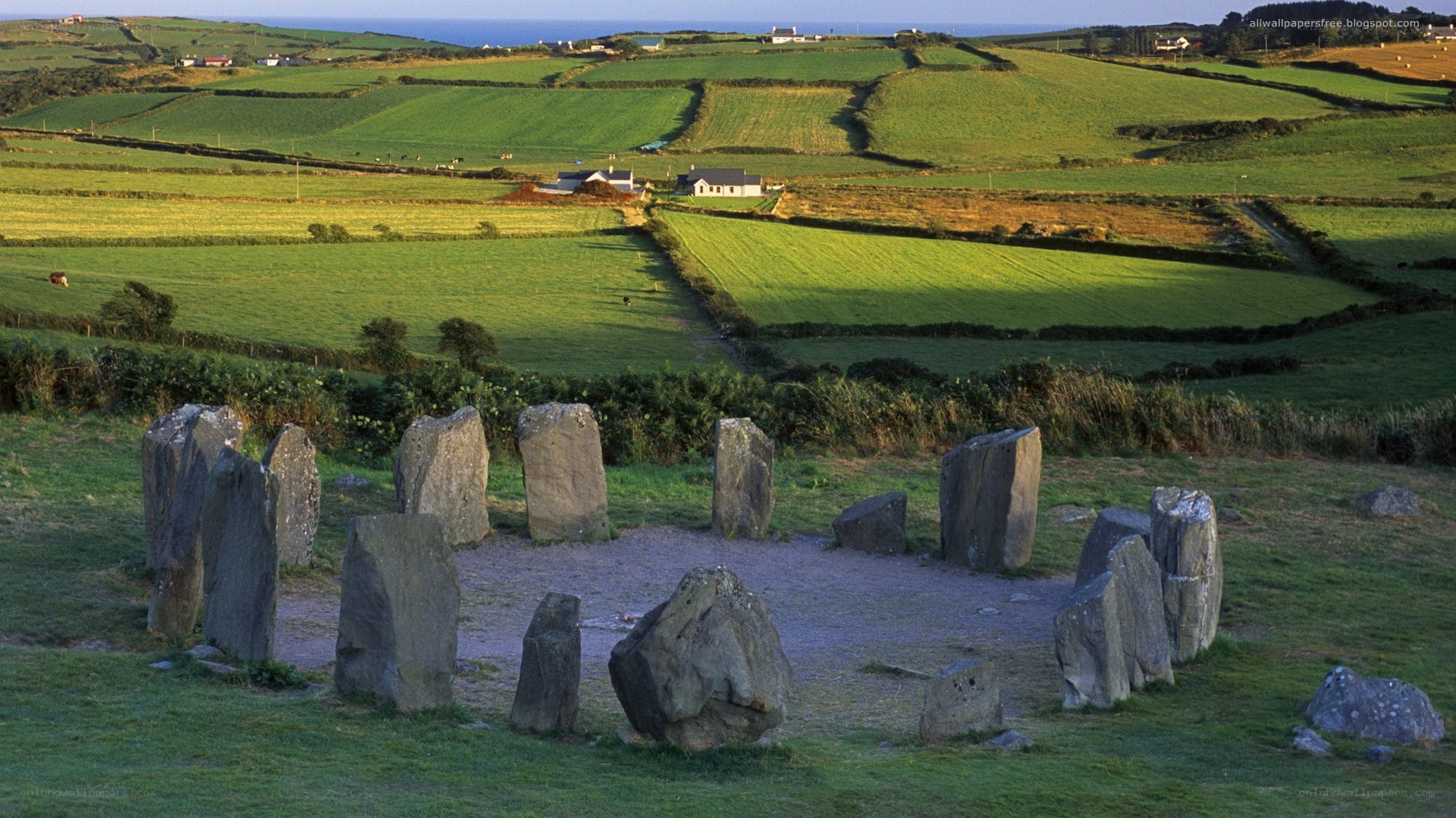 Stone circle in green fields