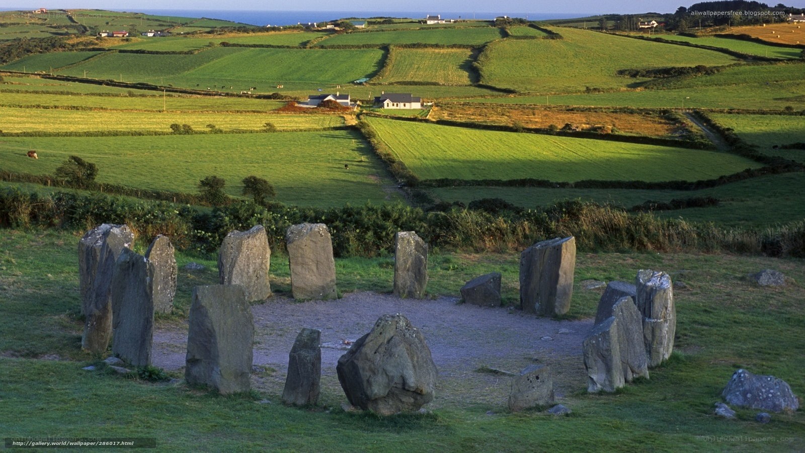 Stone circle in green fields