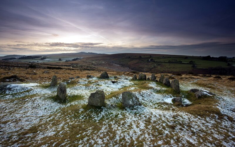 Stone circle on a snowy hill
