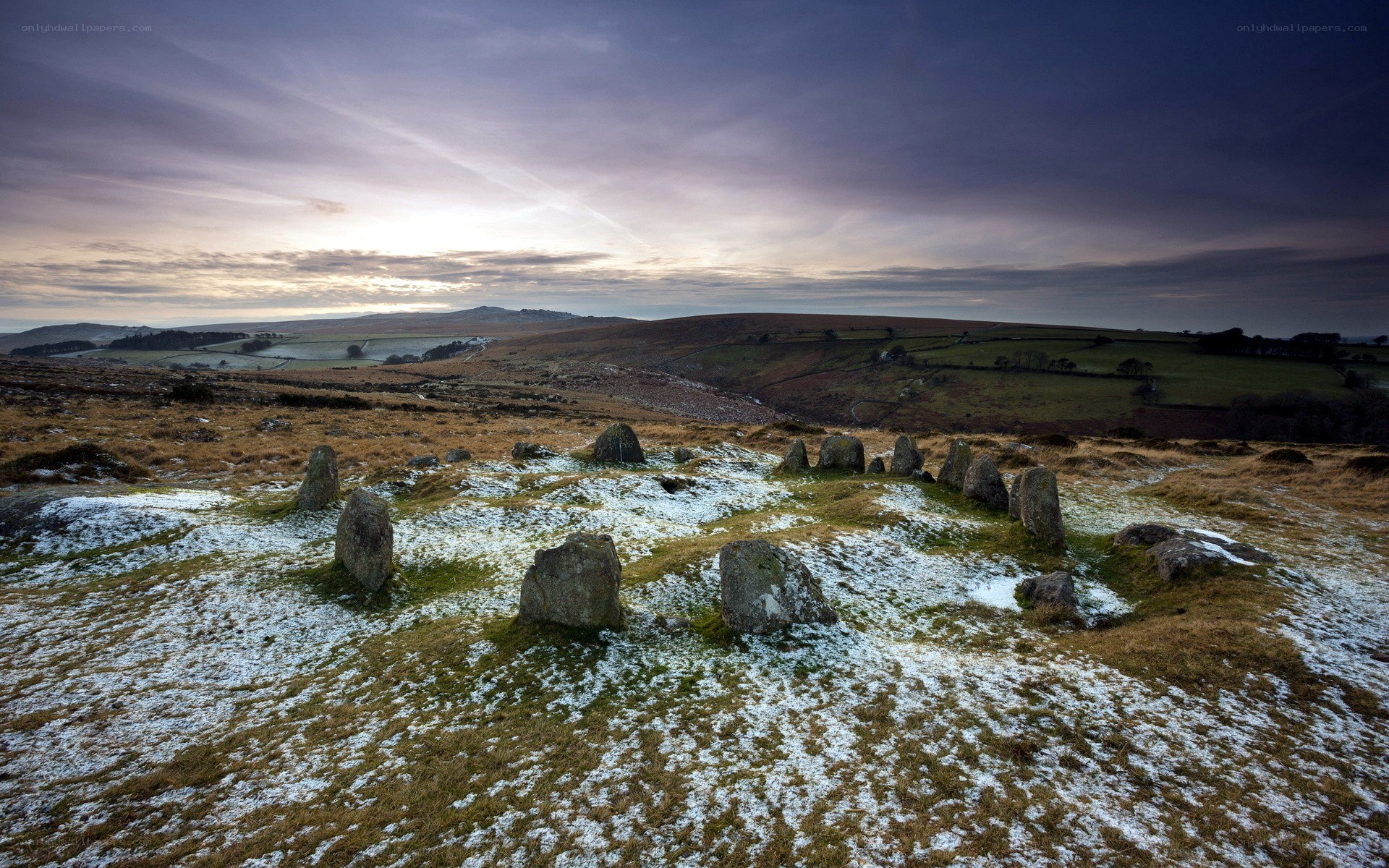 Stone circle on a snowy hill