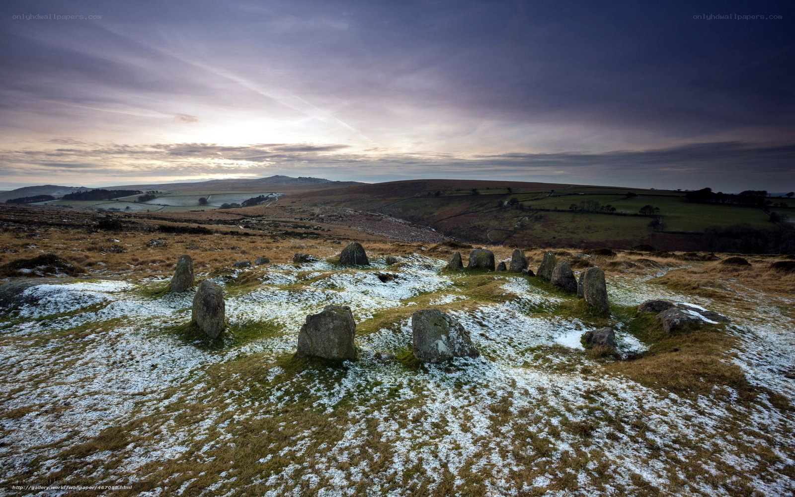 Stone circle on a snowy hill