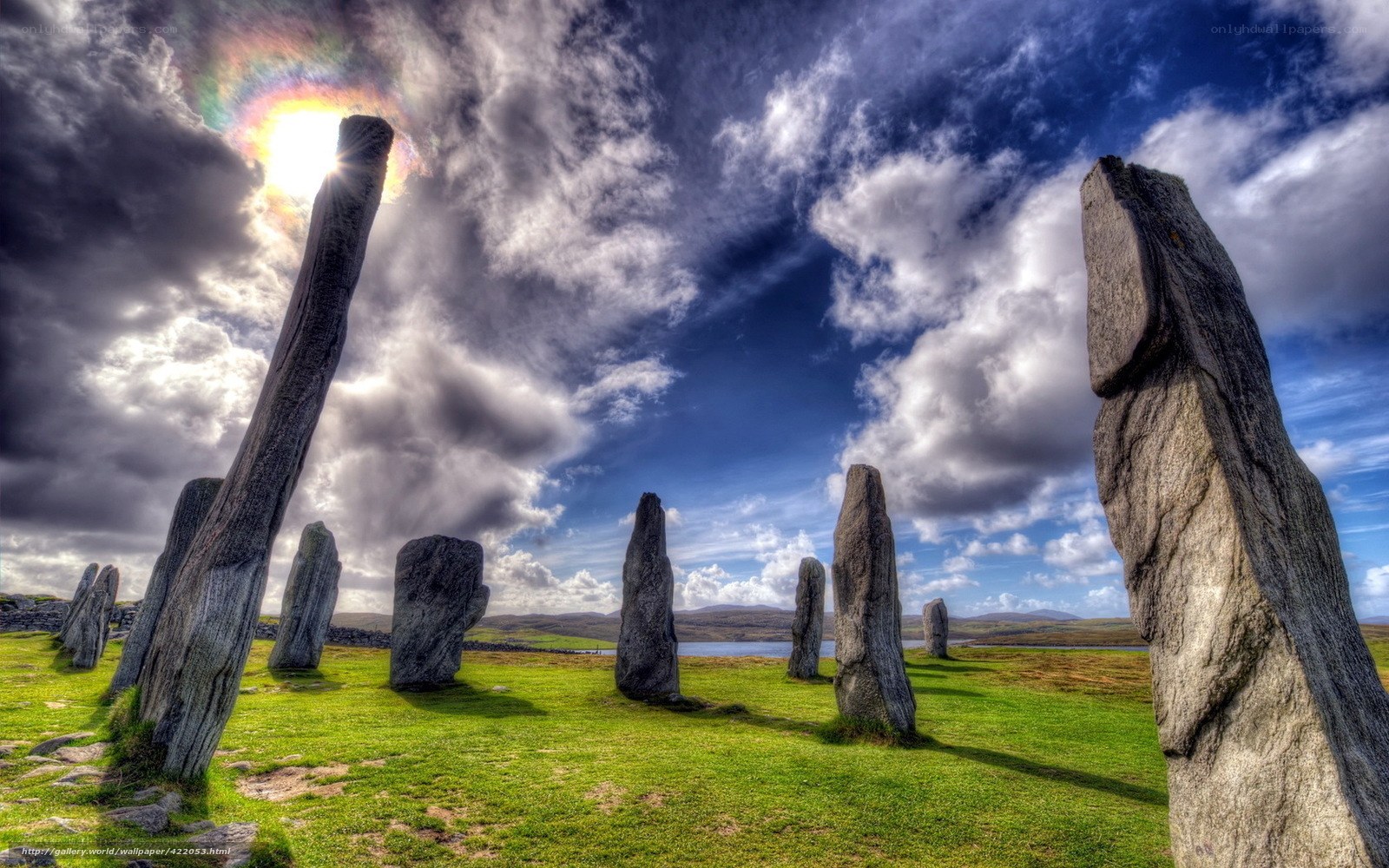 Stone circle under dramatic sky