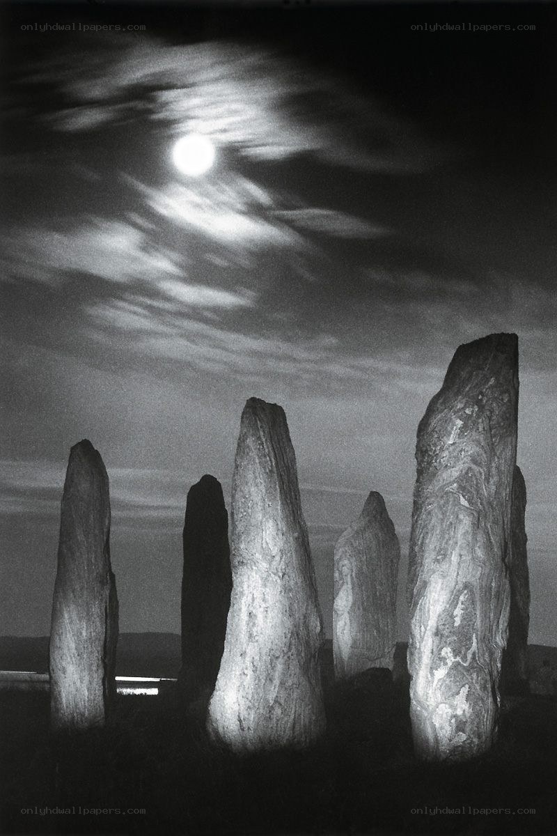 Stone circle under moonlight