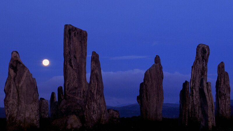 Stone circle under moonlight