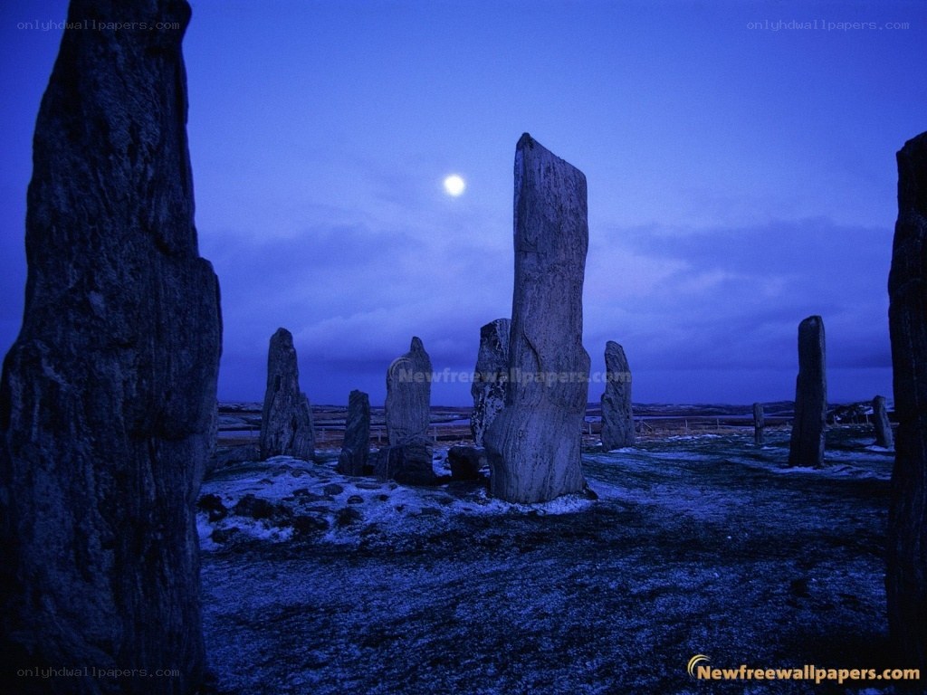 Stone circle under moonlight
