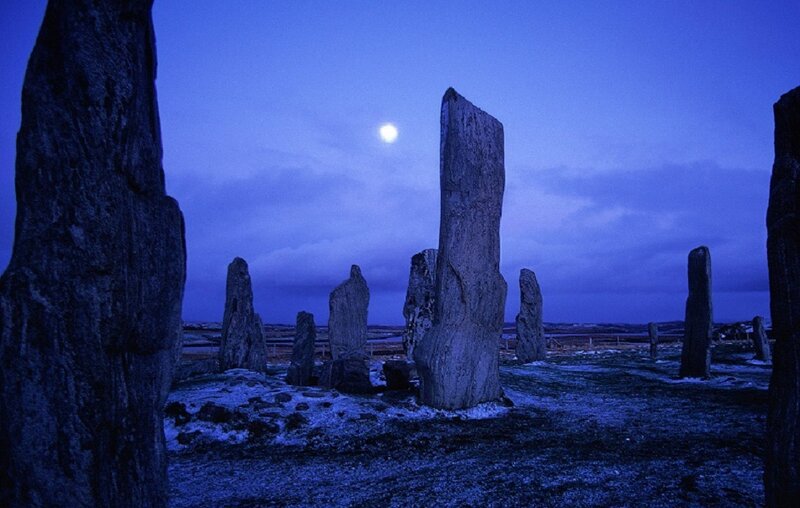 Stone circle under moonlight