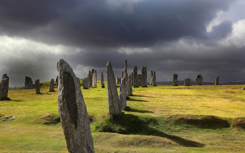 Stone circle under stormy sky