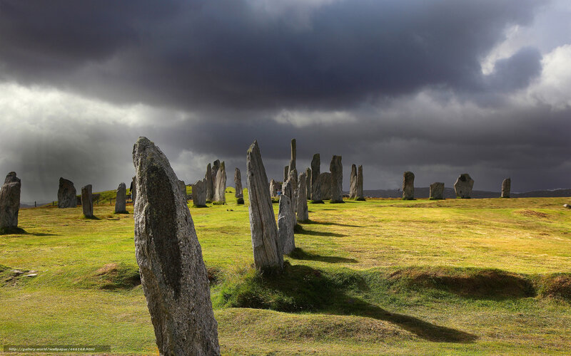 Stone circle under stormy sky