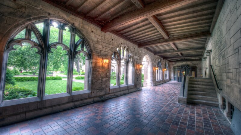Stone Corridor with Arched Windows