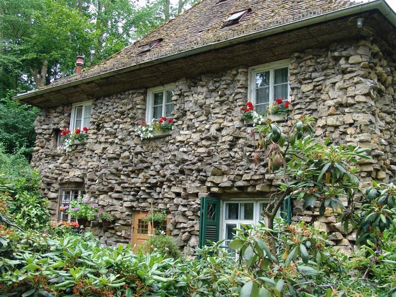 Stone cottage in a lush garden