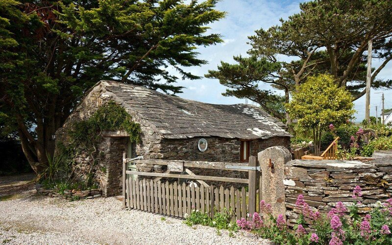 Stone cottage with wooden gate