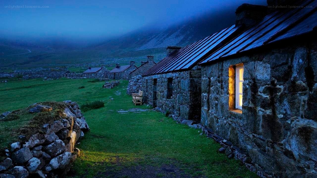 Stone cottages at dusk