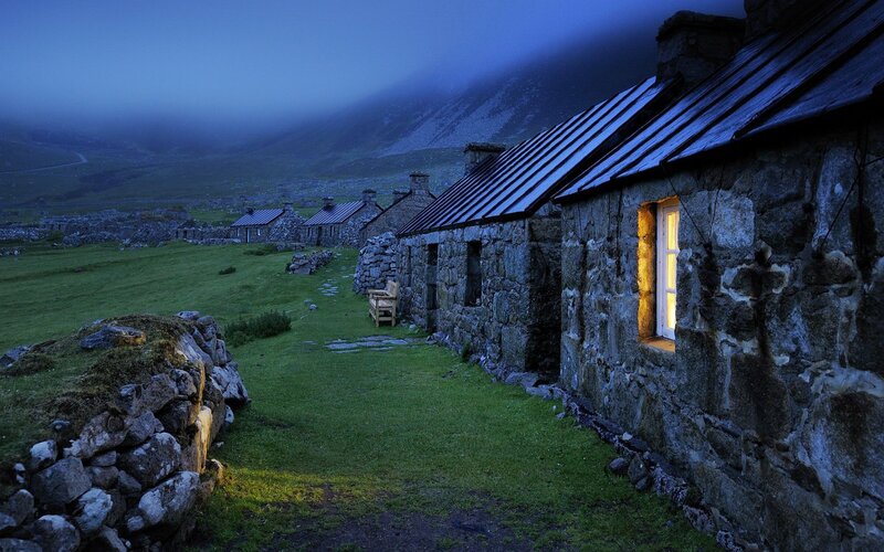 Stone cottages at dusk in the Highlands